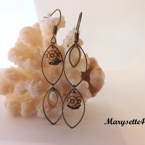 Boucles d'oreilles asymétriques