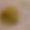 Bouton tissu 40mm "arabesques fond olive" 