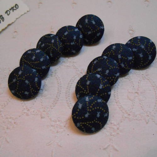 Boutons tissu 18mm recouverts d'un coton clochettes fond bleu 
