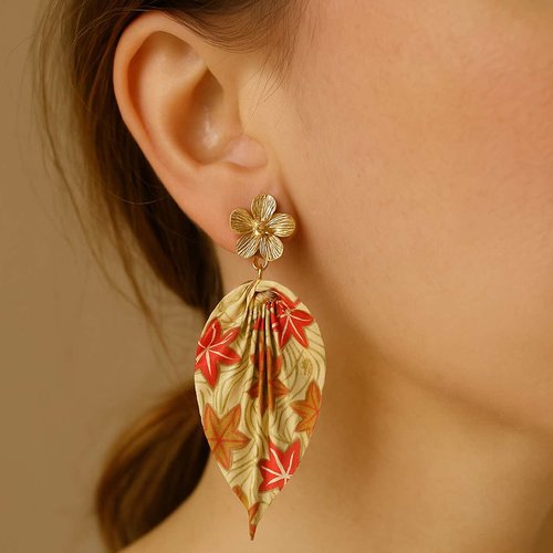 Éblouissez avec élégance!ces boucles d'oreilles en papier japonais sont un must-have pour un look raffiné et unique.