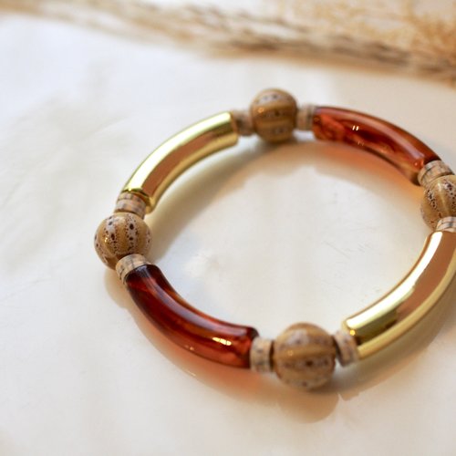 Bracelet tube aux couleurs marron beige avec des perles de céramique et perles heishi