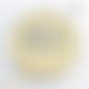 Cabochon rond en verre 25mm yay jaune fond blanc
