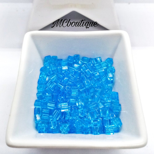Perles miyuki cubes 4mm verre 20g bleu ciel transparent
