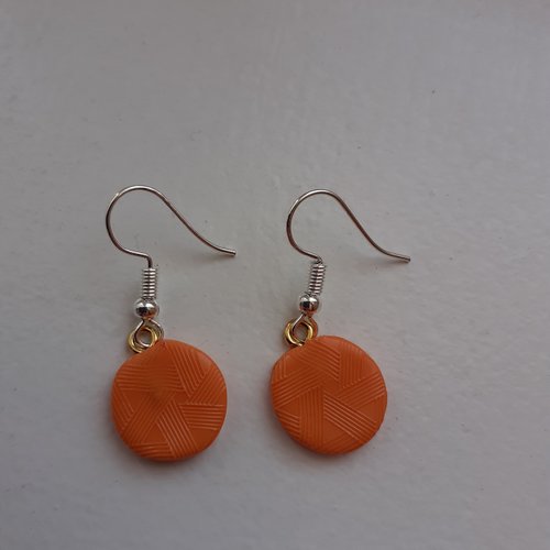 Boucles d'oreilles ronds oranges en relief