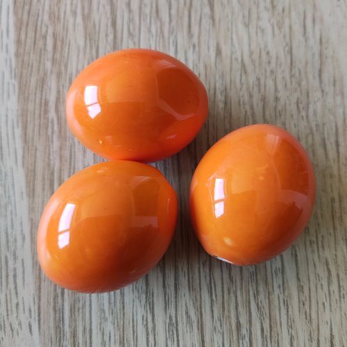 Grande perle en céramique orange