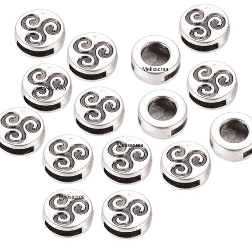 Lot de 15 perles triskell en métal argenté - 12 x 9mm