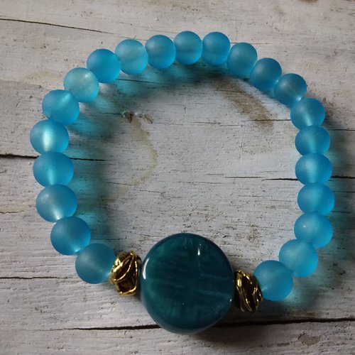 Bracelet élastique en perles de verre turquoises , création artisanale