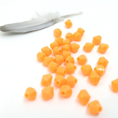 Lot de 35 perles toupies orange acrylique diam 6 x 5 mm