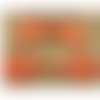 Bouton brandebourg rouge,longueur 14 cm sur largeur  de 5,5 cm