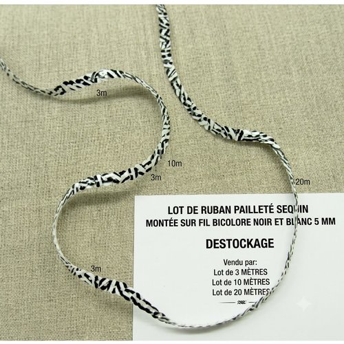 Ruban pailleté sequin montée sur fil ,5 mm, bicolore noir et blanc , vendu par 3 mètres, soit 0.66€ le mètre