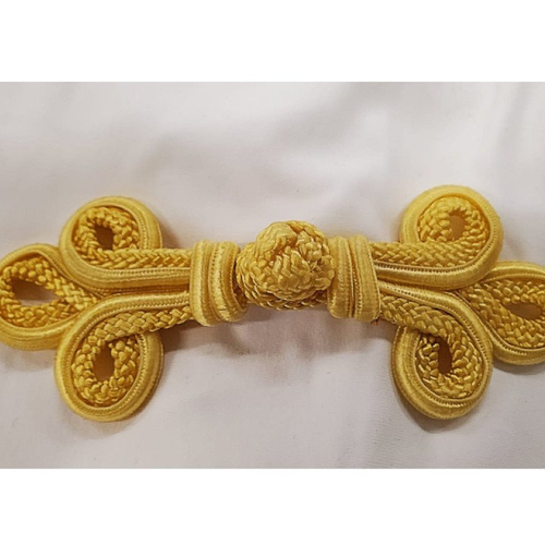 Bouton brandebourg jaune,longueur 14 cm sur largeur de 5,5 cm