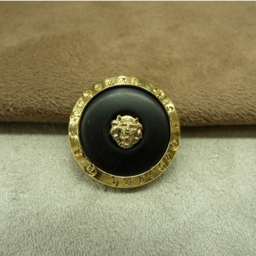 Bouton doré acrylique sur fond noir ,17 mm,de belle qualité