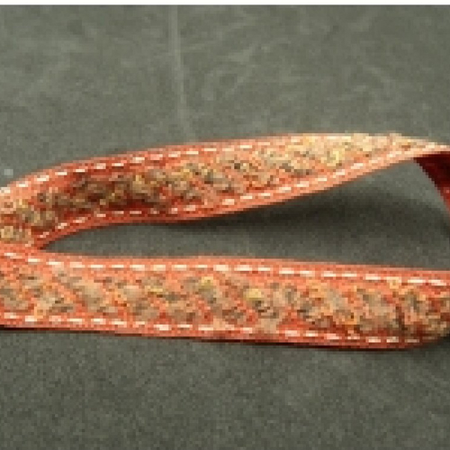 Ruban fantaisie rouge orange sur couture or,1.4 cm