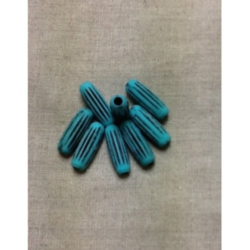 Perles striée turquoise ,diametre: 10mm sur hauteur de 20 mm,vendu par 10
