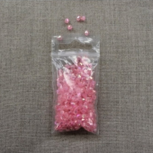 Perles acryliques a facette 4 mm,rose clair,sachet d environ 5 gr