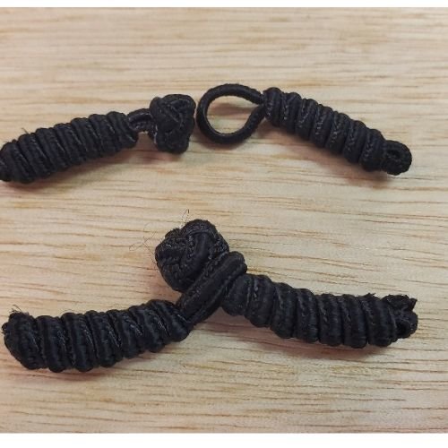 Bouton brandebourg noir longueur 10 cm /diametre 12 mm