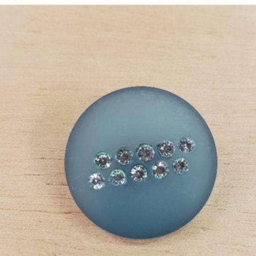Bouton à coudre incrusté de petits strass vert – 23 mm