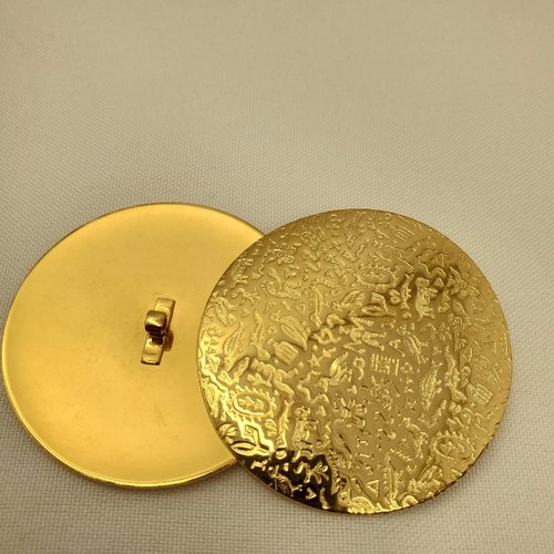 Bouton géant métal doré gravures rupestres 50 mm
