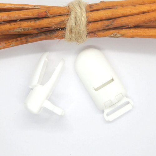 Pince clip/bretelle attache tétine en plastique blanche 40 x 18 mm