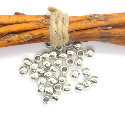 8 perles métal argentées 5 x 6 mm