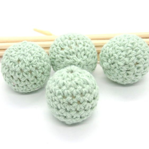Perle en bois crochet coton vert amande 20 mm