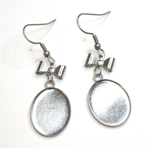 2 boucles d'oreilles support cabochon ovale  acier inoxydable