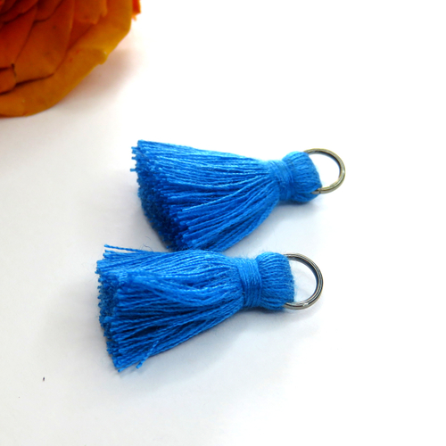 4 pompons bleu anneau métal argenté