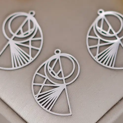 2 pendentifs / breloques géométriques abstrait acier inoxydable