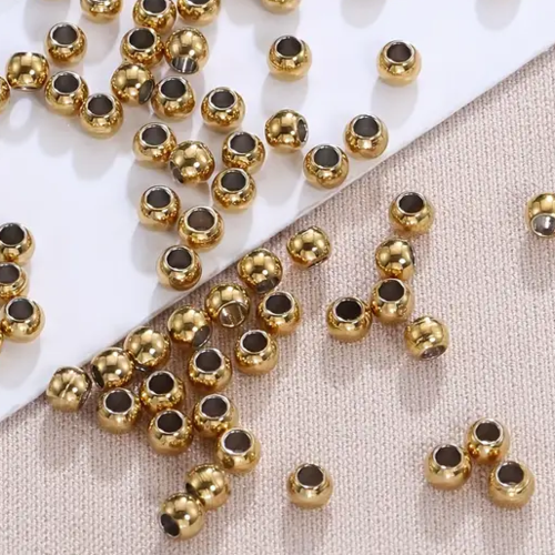 10 perles rondes acier inoxydable 3 mm dorées