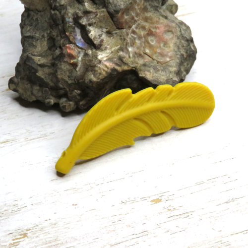 Plume en silicone dentition jaune moutarde 56 mm