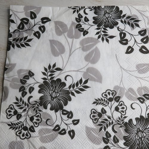 Serviette en papier fleurs graphiques noire et grise