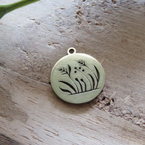 Pendentif fleur acier inoxydable doré