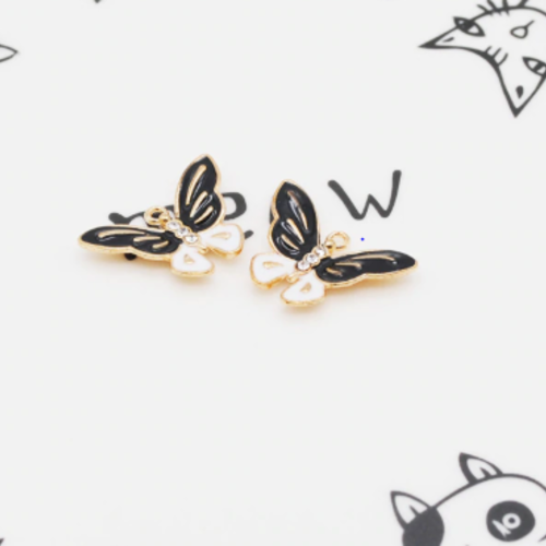 1 breloque papillon noir  - email  -  métal doré