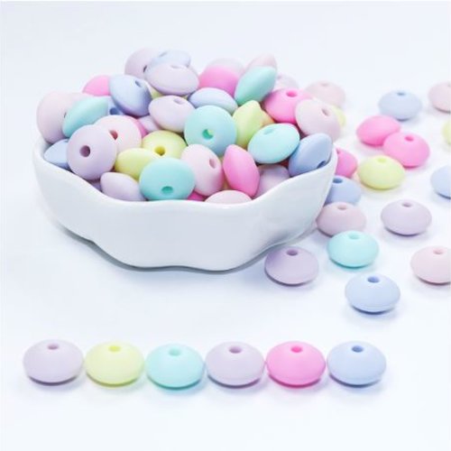 Lot de 12 perles lentilles en silicones - 12 x 7 mm - jaune - parme - rose - fuchsia - vert et bleu - r130