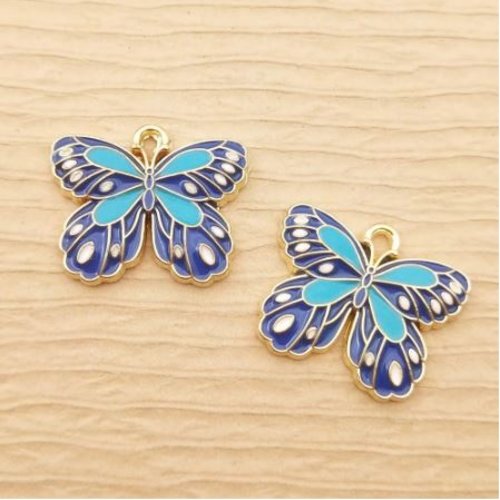 1 breloque pendentif papillon bleu - email - métal doré - r692