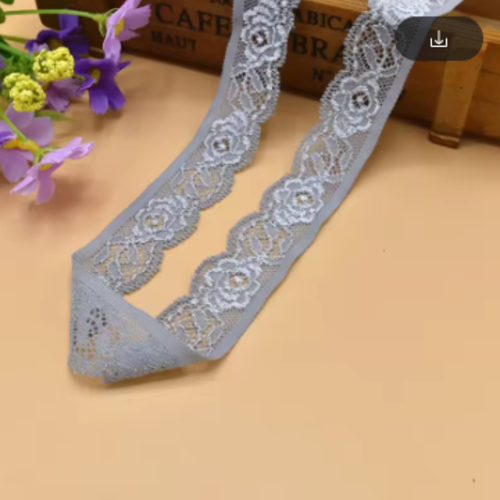 Jolie dentelle élastique - grise - 22 mm - vendu au mètre - d19