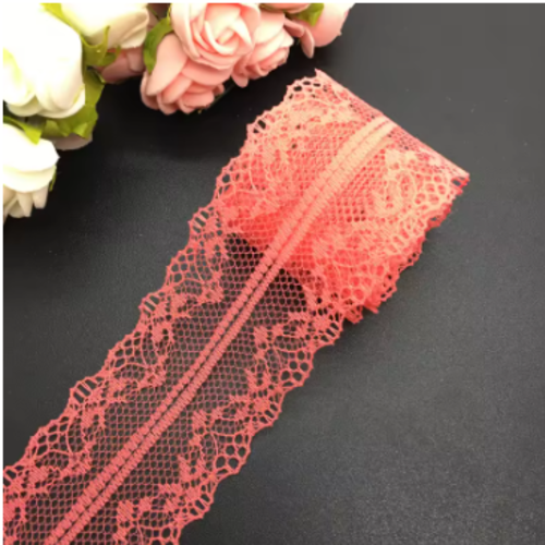 Très jolie dentelle fine - 38 mm - corail - vendu au mètre - d55