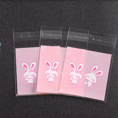 Lot de 10 sachets cadeaux en plastique - motif lapin
