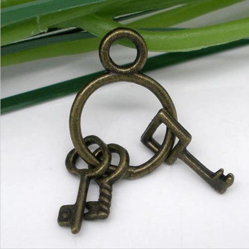 1 breloque pendentif trousseau de clés - métal couleur bronze