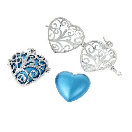1 cage pendentif coeur bleu nacré + 1 coeur bola musical de grossesse ou grelot mexicain