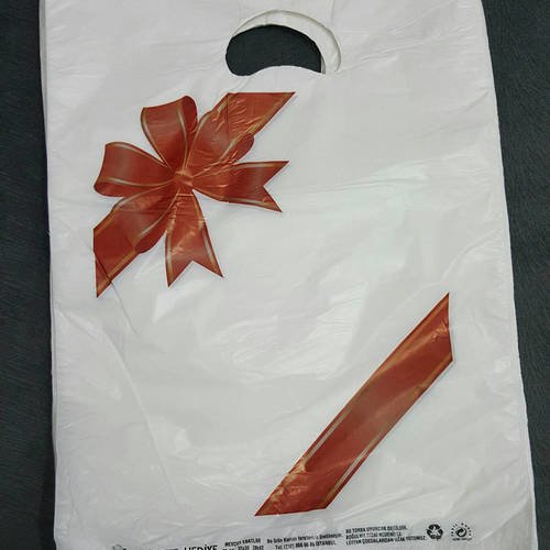 Lot de 100 sacs 20x30cm pochettes cadeaux emballage extra fin plastique décor noeud rouge