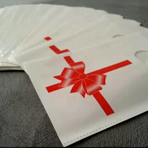 Lot de 100 sacs 10cm pochettes cadeaux plastique décor paquet cadeau noeud rouge raf c5