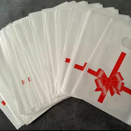 Lot de 100 sacs 15cm pochettes cadeaux plastique décor paquet cadeau noeud rouge b67