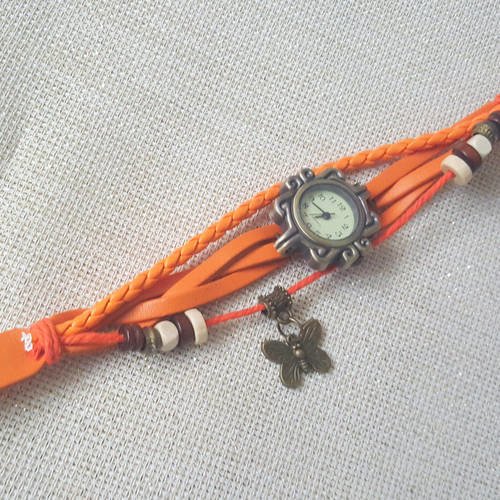 Montre métal bronzé avec bracelet cuir et cotton ciré orange et breloque feuille b37