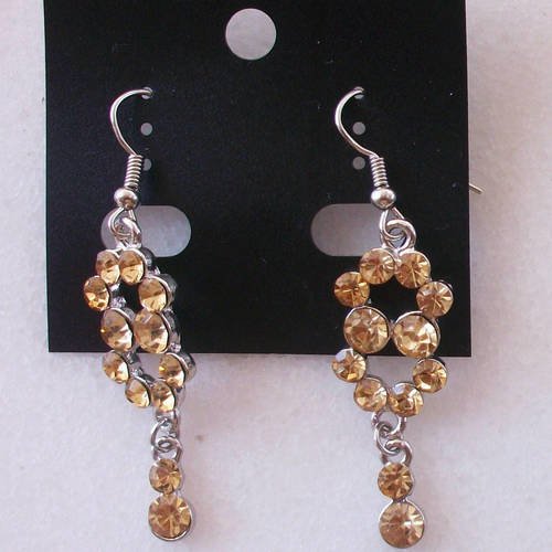 Boucles d'oreilles infini en métal argenté et strass jaune bijoux b31