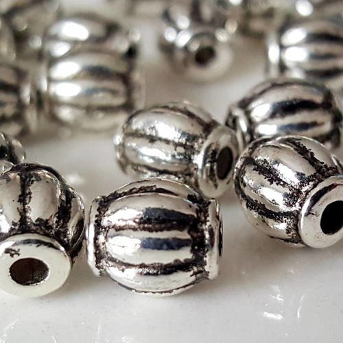 12 perles olive ovales 5x6mm forme en métal argenté 
