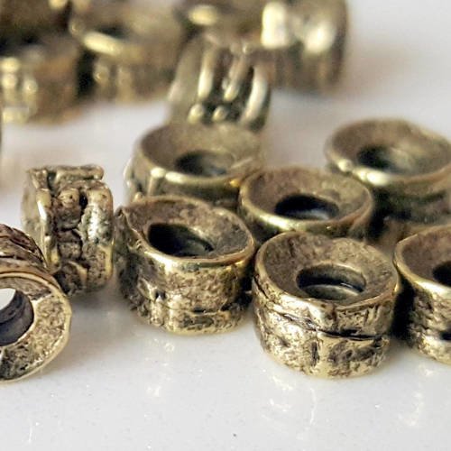 200 entretoises tube 4mm avec motifs incrustés en métal bronzé 