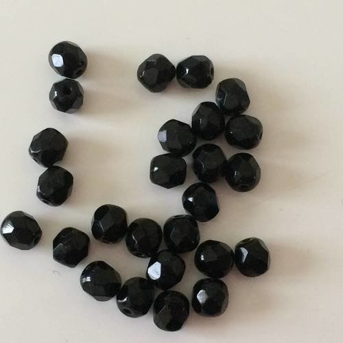 Perle ovale cristal à facette noir de entre 4 et 5 mm environ 
