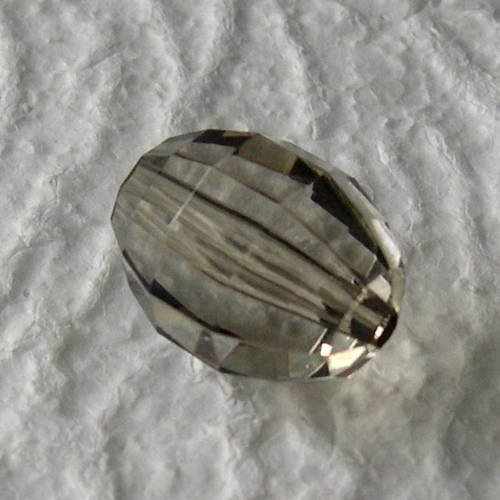 Grosse perle syntétique à facettes 30x20 mm. 