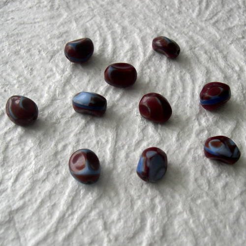 Lot de 10 perles synthétiques forme irrégulière 15x10 mm. 
